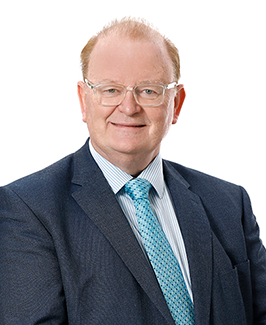 Headshot of Mr. Denis O'Sullivan