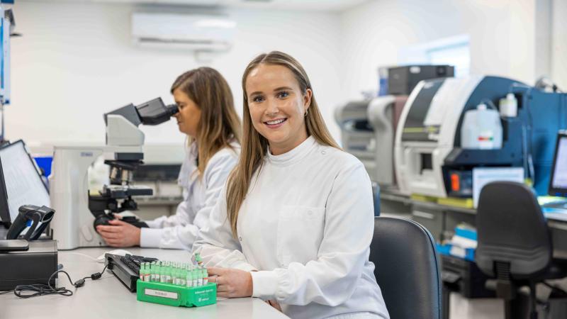 Lab staff smiling