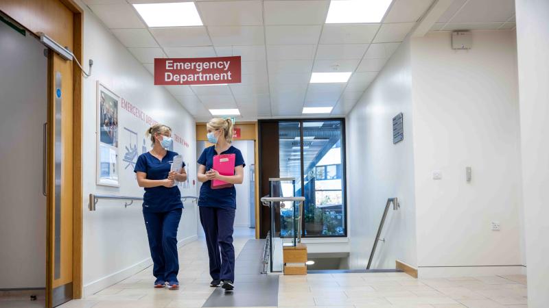 2 Nurses walking