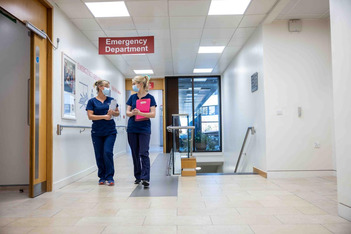 2 Nurses walking